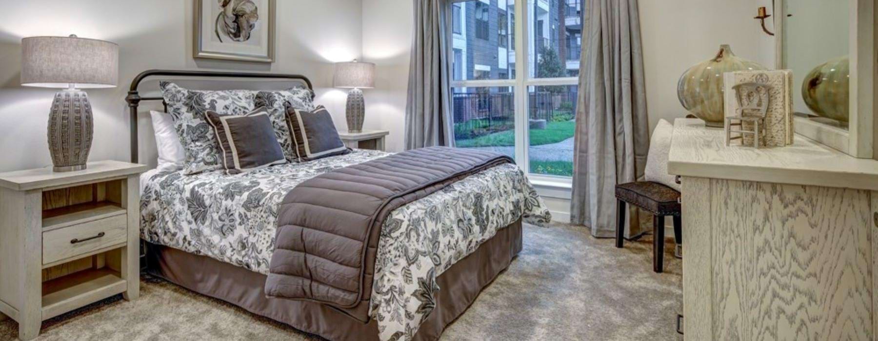oversized window in spacious bedroom
